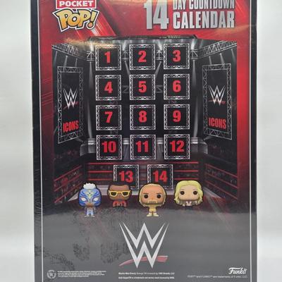 LOT 6: Pocket Pops 14 Day Wrestling Calendar, Wrestle Mania Priority Pass, and Rocky Maivia Pop NIB