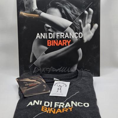 LOT 11: New in Sealed Plastic Signed Ani Di Franco Album, T-Shirt, and Lyrics Booklet