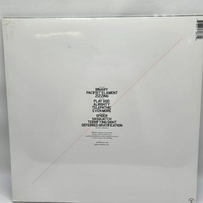 LOT 11: New in Sealed Plastic Signed Ani Di Franco Album, T-Shirt, and Lyrics Booklet