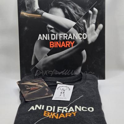 LOT 11: New in Sealed Plastic Signed Ani Di Franco Album, T-Shirt, and Lyrics Booklet
