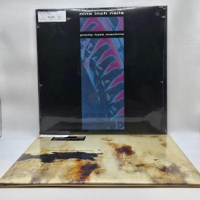 LOT 14: New in Sealed Plastic Nine Inch Nails Pretty Hate Machine and The Downward Spiral