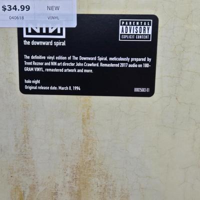 LOT 14: New in Sealed Plastic Nine Inch Nails Pretty Hate Machine and The Downward Spiral