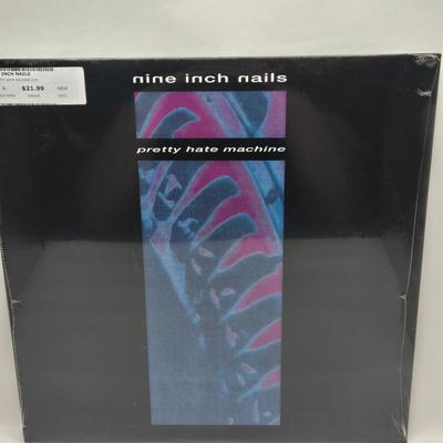 LOT 14: New in Sealed Plastic Nine Inch Nails Pretty Hate Machine and The Downward Spiral