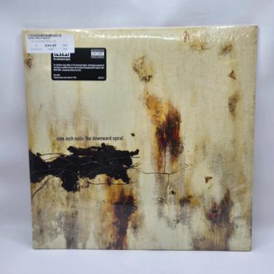 LOT 14: New in Sealed Plastic Nine Inch Nails Pretty Hate Machine and The Downward Spiral