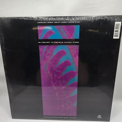 LOT 14: New in Sealed Plastic Nine Inch Nails Pretty Hate Machine and The Downward Spiral