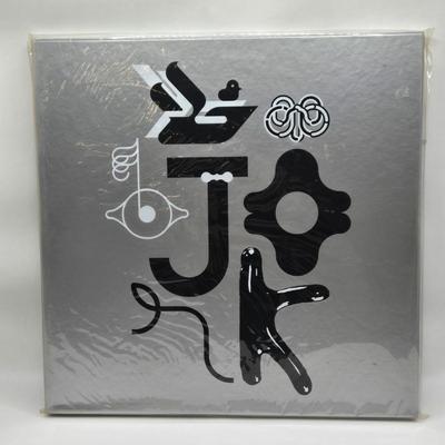 LOT 19: New in Sealed Plastic Bjork Eight Characters Lithograph Box Set and Mid-Career Retrospective