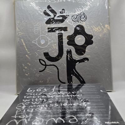 LOT 19: New in Sealed Plastic Bjork Eight Characters Lithograph Box Set and Mid-Career Retrospective