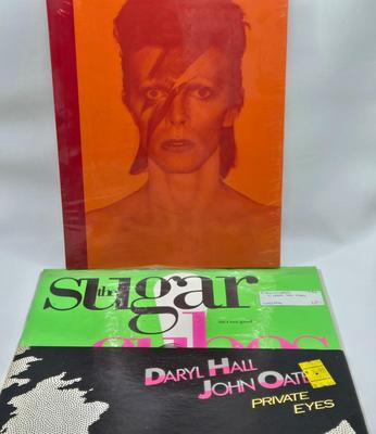 LOT 20: New in Sealed Plastic David Bowie is in Here , and Unsealed Daryl Hall and John Oates Private Eyes , and The Sugar Cubes...