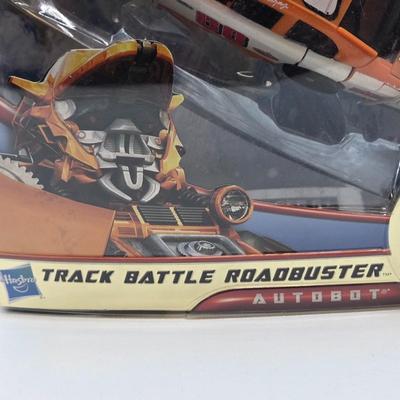 LOT 43: NIB Holiday Optimus Prime and Transformers Dark of the Moon Mechtech Weapons System