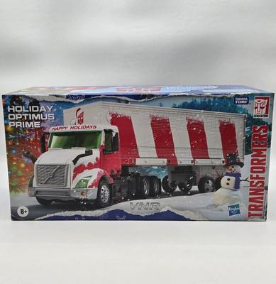 LOT 43: NIB Holiday Optimus Prime and Transformers Dark of the Moon Mechtech Weapons System
