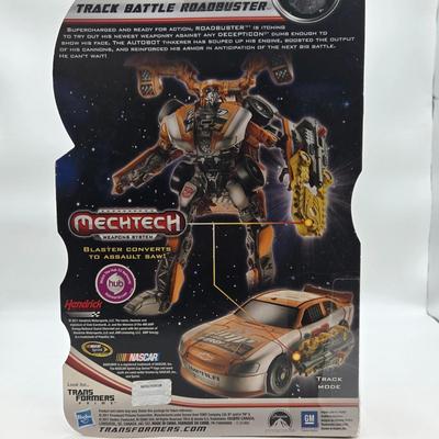 LOT 43: NIB Holiday Optimus Prime and Transformers Dark of the Moon Mechtech Weapons System