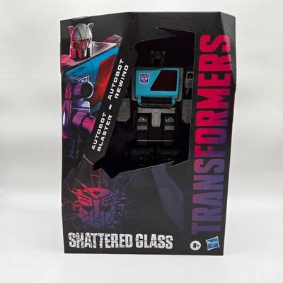 LOT 49: New in Packaging Transformers Shattered Glass Toys and Comic Books
