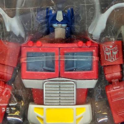 LOT 52: NIB Transformers R.E.D. Toys