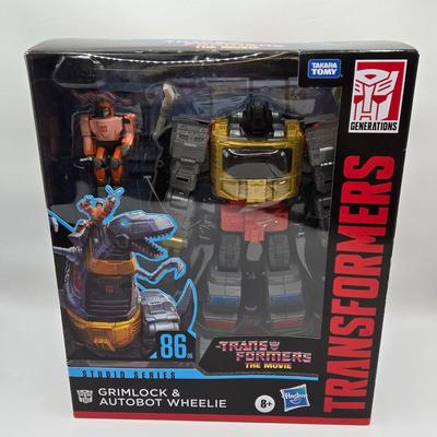 LOT 58: Transformers The Movie Studio Series Grimlock and Autobot Wheelie NIB