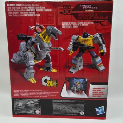 LOT 58: Transformers The Movie Studio Series Grimlock and Autobot Wheelie NIB