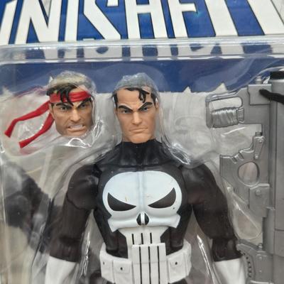 LOT 63: New in Packaging Iron Man, Black Widow, and The Punisher