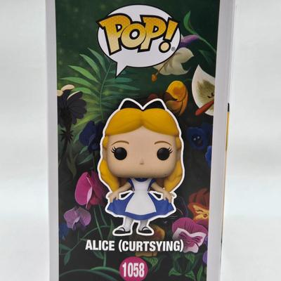LOT 73: NIB Funko Pops Alice in Wonderland , Queen of Hearts, White Rabbit, and Mad Hatter