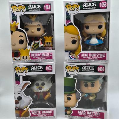 LOT 73: NIB Funko Pops Alice in Wonderland , Queen of Hearts, White Rabbit, and Mad Hatter