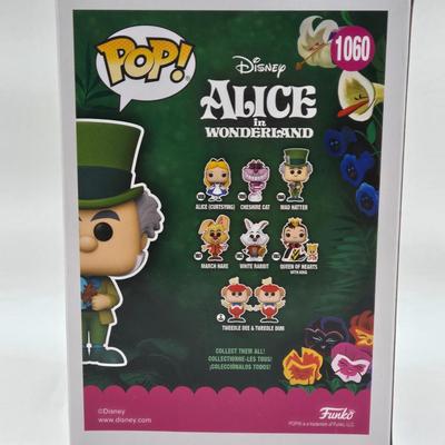 LOT 73: NIB Funko Pops Alice in Wonderland , Queen of Hearts, White Rabbit, and Mad Hatter