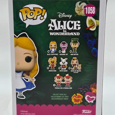LOT 73: NIB Funko Pops Alice in Wonderland , Queen of Hearts, White Rabbit, and Mad Hatter
