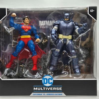 LOT 79: 2 Sets of DC Multiverse Superman vs. Batman NIB
