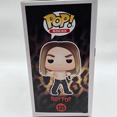 LOT 122: NIB Funko Pops Including Iggy Pop, Tupac Shakur, Notorious B.I.G., Janis Joplin , and Metallica Lady Justice