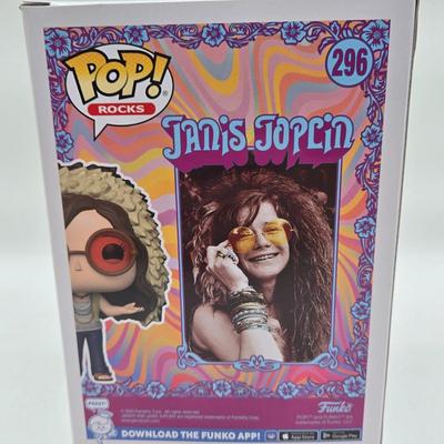 LOT 122: NIB Funko Pops Including Iggy Pop, Tupac Shakur, Notorious B.I.G., Janis Joplin , and Metallica Lady Justice