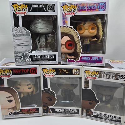 LOT 122: NIB Funko Pops Including Iggy Pop, Tupac Shakur, Notorious B.I.G., Janis Joplin , and Metallica Lady Justice