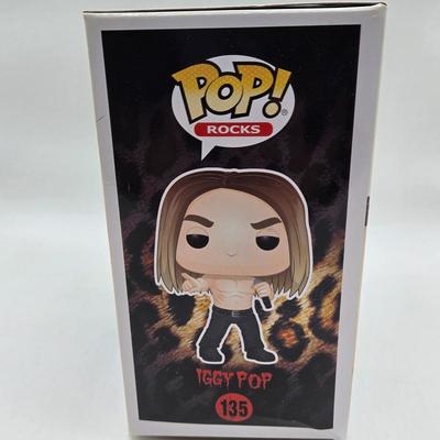 LOT 122: NIB Funko Pops Including Iggy Pop, Tupac Shakur, Notorious B.I.G., Janis Joplin , and Metallica Lady Justice