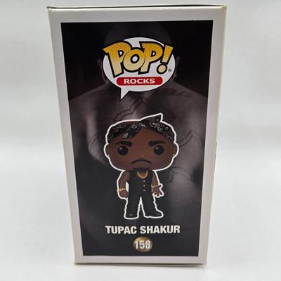 LOT 122: NIB Funko Pops Including Iggy Pop, Tupac Shakur, Notorious B.I.G., Janis Joplin , and Metallica Lady Justice