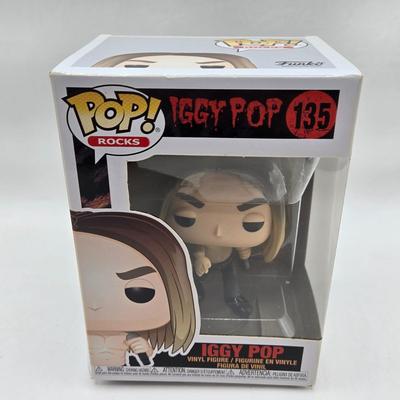 LOT 122: NIB Funko Pops Including Iggy Pop, Tupac Shakur, Notorious B.I.G., Janis Joplin , and Metallica Lady Justice