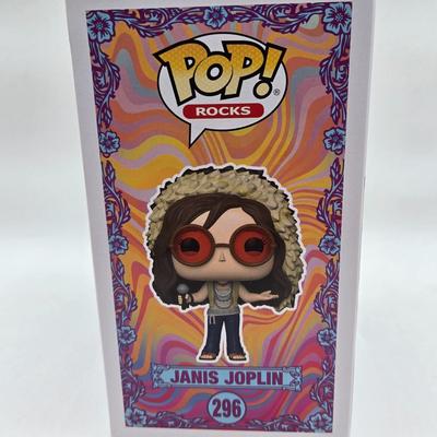LOT 122: NIB Funko Pops Including Iggy Pop, Tupac Shakur, Notorious B.I.G., Janis Joplin , and Metallica Lady Justice