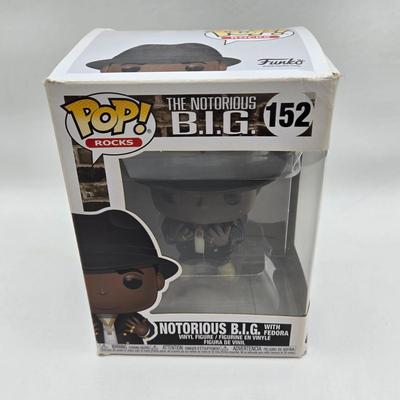 LOT 122: NIB Funko Pops Including Iggy Pop, Tupac Shakur, Notorious B.I.G., Janis Joplin , and Metallica Lady Justice