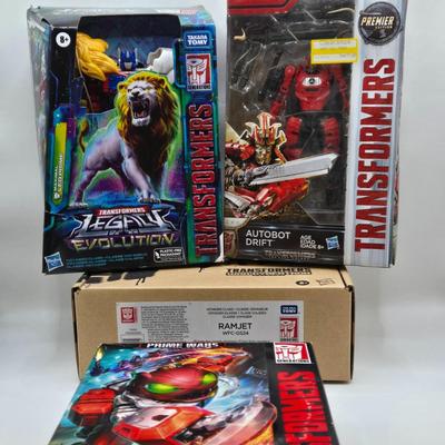 LOT 129: Variety of Transformer Toys NIB