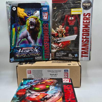 LOT 129: Variety of Transformer Toys NIB