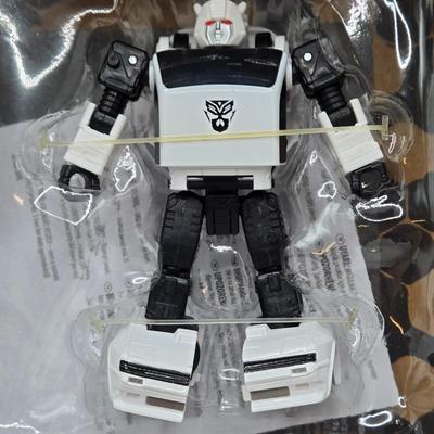 LOT 140: NIB Transformers Alternate Universe Optimus Prime and War for Cybertron Trilogy Bug Bite