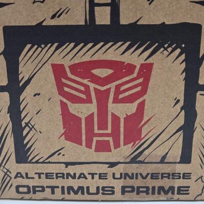 LOT 140: NIB Transformers Alternate Universe Optimus Prime and War for Cybertron Trilogy Bug Bite