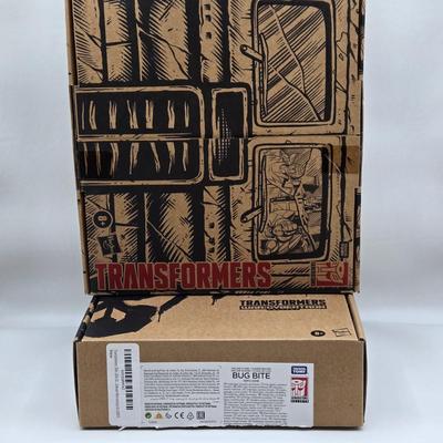 LOT 140: NIB Transformers Alternate Universe Optimus Prime and War for Cybertron Trilogy Bug Bite