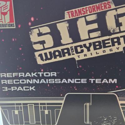LOT 141: NIB Transformers Siege War for Cybertron Trilogy Refraktor Reconnaissance Team 3-Pack