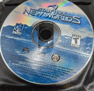LOT 155: Multiple PC Games Including Star Trek Voyager Elite Force, Star Craft, and More