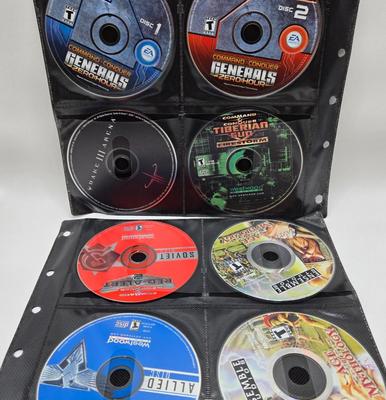 LOT 155: Multiple PC Games Including Star Trek Voyager Elite Force, Star Craft, and More