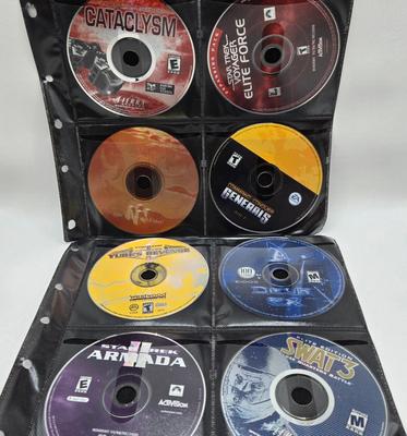 LOT 155: Multiple PC Games Including Star Trek Voyager Elite Force, Star Craft, and More