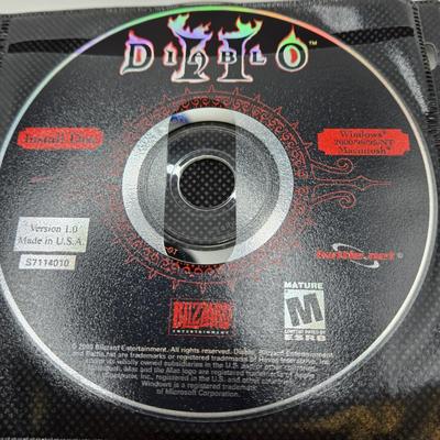 LOT 155: Multiple PC Games Including Star Trek Voyager Elite Force, Star Craft, and More