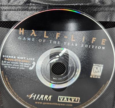 LOT 155: Multiple PC Games Including Star Trek Voyager Elite Force, Star Craft, and More