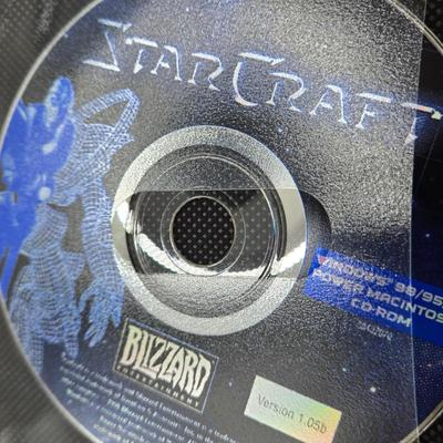 LOT 155: Multiple PC Games Including Star Trek Voyager Elite Force, Star Craft, and More