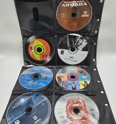 LOT 155: Multiple PC Games Including Star Trek Voyager Elite Force, Star Craft, and More