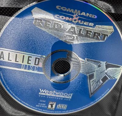 LOT 155: Multiple PC Games Including Star Trek Voyager Elite Force, Star Craft, and More