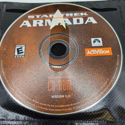 LOT 155: Multiple PC Games Including Star Trek Voyager Elite Force, Star Craft, and More