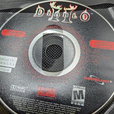 LOT 155: Multiple PC Games Including Star Trek Voyager Elite Force, Star Craft, and More