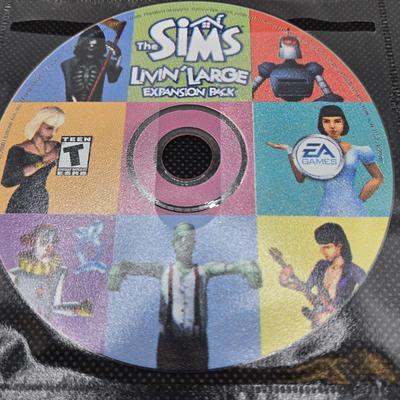 LOT 155: Multiple PC Games Including Star Trek Voyager Elite Force, Star Craft, and More